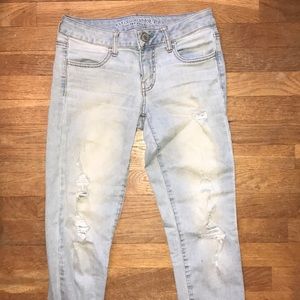 Light wash lightly ripped jeans